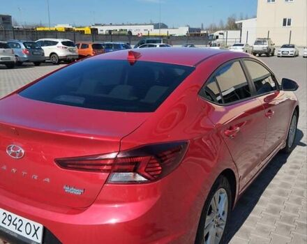 Красный Хендай Элантра, объемом двигателя 2 л и пробегом 60 тыс. км за 13600 $, фото 5 на Automoto.ua