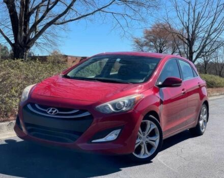 Красный Хендай Элантра, объемом двигателя 2 л и пробегом 88 тыс. км за 13550 $, фото 1 на Automoto.ua