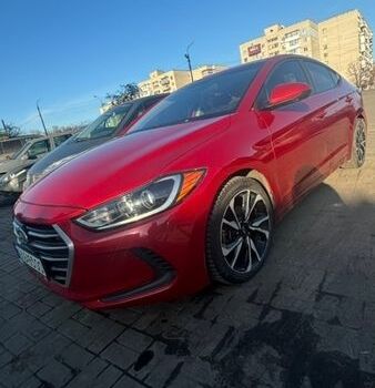 Красный Хендай Элантра, объемом двигателя 2 л и пробегом 141 тыс. км за 10300 $, фото 1 на Automoto.ua