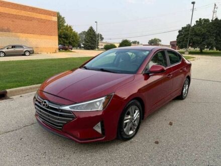 Красный Хендай Элантра, объемом двигателя 2 л и пробегом 51 тыс. км за 4300 $, фото 1 на Automoto.ua