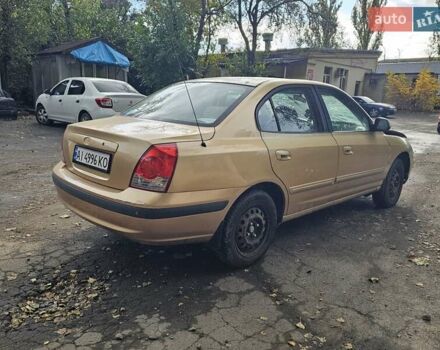 Желтый Хендай Элантра, объемом двигателя 1.99 л и пробегом 200 тыс. км за 1400 $, фото 2 на Automoto.ua