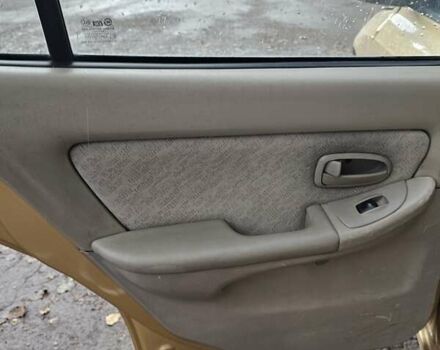 Желтый Хендай Элантра, объемом двигателя 1.99 л и пробегом 200 тыс. км за 1400 $, фото 17 на Automoto.ua