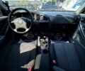 Серый Хендай Элантра, объемом двигателя 2 л и пробегом 291 тыс. км за 4400 $, фото 8 на Automoto.ua