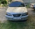 Серый Хендай Элантра, объемом двигателя 2 л и пробегом 228 тыс. км за 2456 $, фото 1 на Automoto.ua