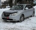 Сірий Хендай Елантра, об'ємом двигуна 2 л та пробігом 260 тис. км за 6490 $, фото 1 на Automoto.ua