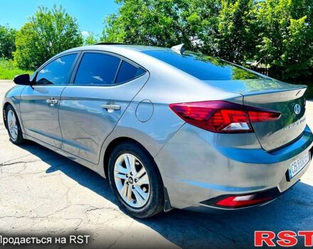 Сірий Хендай Елантра, об'ємом двигуна 2 л та пробігом 106 тис. км за 11999 $, фото 4 на Automoto.ua
