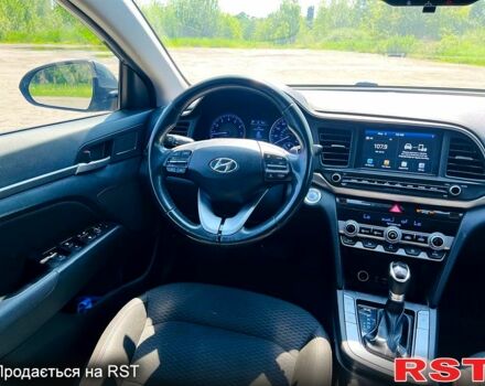 Сірий Хендай Елантра, об'ємом двигуна 2 л та пробігом 106 тис. км за 11999 $, фото 7 на Automoto.ua