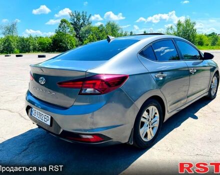 Сірий Хендай Елантра, об'ємом двигуна 2 л та пробігом 106 тис. км за 11999 $, фото 3 на Automoto.ua