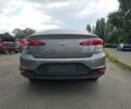 Серый Хендай Элантра, объемом двигателя 2 л и пробегом 30 тыс. км за 15800 $, фото 4 на Automoto.ua