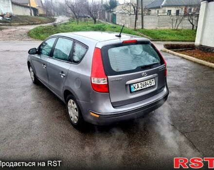 Сірий Хендай Елантра, об'ємом двигуна 2 л та пробігом 250 тис. км за 4750 $, фото 4 на Automoto.ua