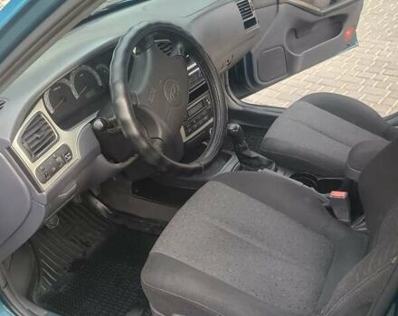 Синий Хендай Элантра, объемом двигателя 1.6 л и пробегом 320 тыс. км за 2800 $, фото 9 на Automoto.ua