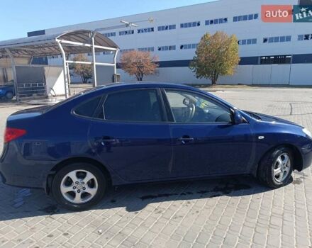 Синий Хендай Элантра, объемом двигателя 2 л и пробегом 267 тыс. км за 5900 $, фото 6 на Automoto.ua