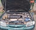 Зеленый Хендай Элантра, объемом двигателя 1.8 л и пробегом 300 тыс. км за 227 $, фото 1 на Automoto.ua
