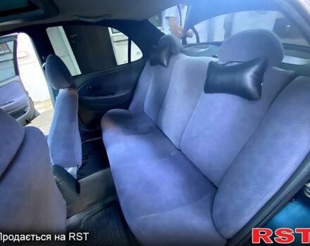 Зеленый Хендай Элантра, объемом двигателя 1.6 л и пробегом 242 тыс. км за 2700 $, фото 12 на Automoto.ua