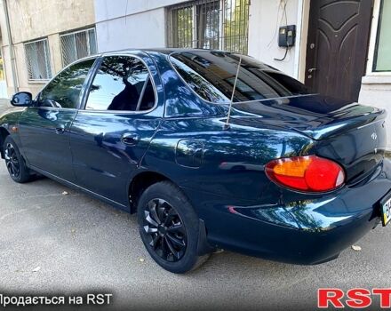 Зеленый Хендай Элантра, объемом двигателя 1.6 л и пробегом 242 тыс. км за 2700 $, фото 7 на Automoto.ua