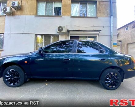 Зеленый Хендай Элантра, объемом двигателя 1.6 л и пробегом 242 тыс. км за 2700 $, фото 5 на Automoto.ua