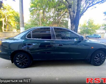 Зеленый Хендай Элантра, объемом двигателя 1.6 л и пробегом 242 тыс. км за 2700 $, фото 4 на Automoto.ua