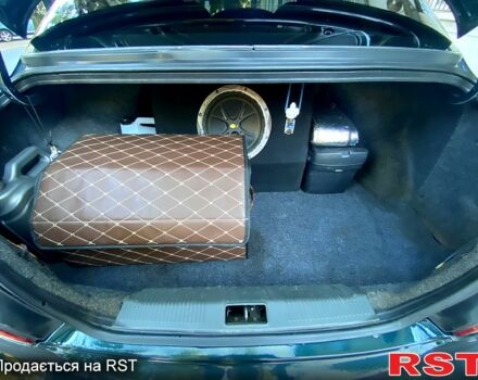 Зеленый Хендай Элантра, объемом двигателя 1.6 л и пробегом 242 тыс. км за 2700 $, фото 9 на Automoto.ua