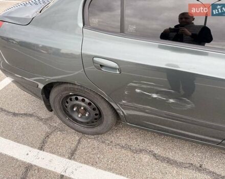 Зеленый Хендай Элантра, объемом двигателя 1.6 л и пробегом 195 тыс. км за 5500 $, фото 16 на Automoto.ua