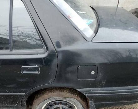 Черный Хендай Ексель, объемом двигателя 1.5 л и пробегом 417 тыс. км за 1000 $, фото 1 на Automoto.ua