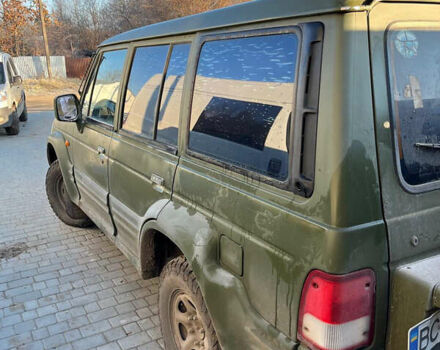 Зеленый Хендай Галлопер, объемом двигателя 2.48 л и пробегом 225 тыс. км за 4000 $, фото 4 на Automoto.ua