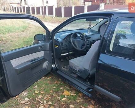 Черный Хендай Гетц, объемом двигателя 1.09 л и пробегом 247 тыс. км за 3700 $, фото 4 на Automoto.ua