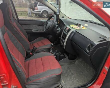 Красный Хендай Гетц, объемом двигателя 1.34 л и пробегом 200 тыс. км за 4000 $, фото 5 на Automoto.ua