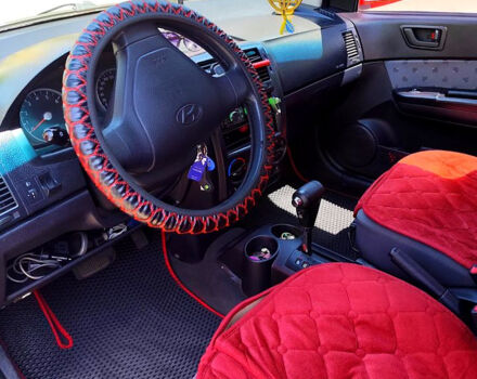 Красный Хендай Гетц, объемом двигателя 1.6 л и пробегом 200 тыс. км за 4200 $, фото 4 на Automoto.ua