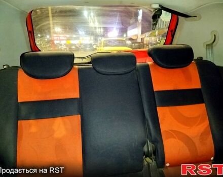 Красный Хендай Гетц, объемом двигателя 1.4 л и пробегом 250 тыс. км за 3200 $, фото 2 на Automoto.ua