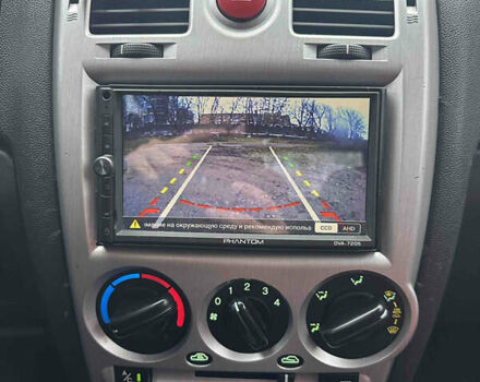 Красный Хендай Гетц, объемом двигателя 1.4 л и пробегом 201 тыс. км за 5600 $, фото 11 на Automoto.ua