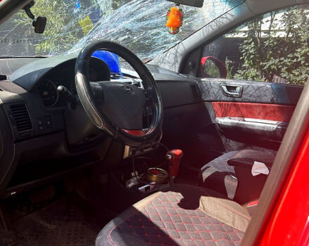 Красный Хендай Гетц, объемом двигателя 1.4 л и пробегом 190 тыс. км за 1500 $, фото 5 на Automoto.ua