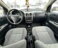 Серый Хендай Гетц, объемом двигателя 1.5 л и пробегом 300 тыс. км за 3850 $, фото 3 на Automoto.ua