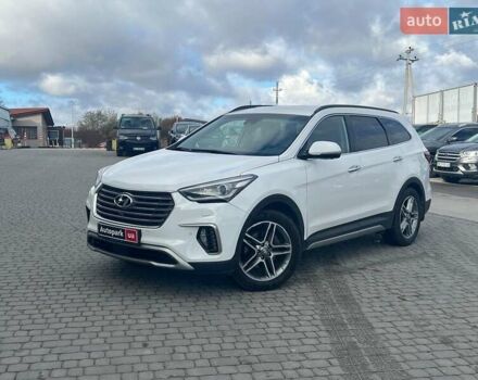 Белый Хендай Гранд Санта Фе, объемом двигателя 2.2 л и пробегом 124 тыс. км за 32580 $, фото 3 на Automoto.ua