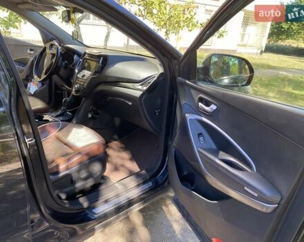 Черный Хендай Гранд Санта Фе, объемом двигателя 2.2 л и пробегом 169 тыс. км за 20500 $, фото 6 на Automoto.ua