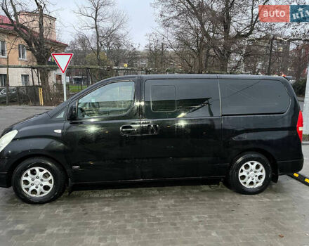 Черный Хендай Гранд Старекс, объемом двигателя 2.5 л и пробегом 312 тыс. км за 12800 $, фото 18 на Automoto.ua