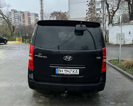 Черный Хендай Гранд Старекс, объемом двигателя 2.5 л и пробегом 312 тыс. км за 12800 $, фото 17 на Automoto.ua