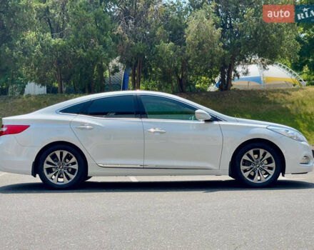 Белый Хендай Грандер, объемом двигателя 3 л и пробегом 150 тыс. км за 16000 $, фото 2 на Automoto.ua