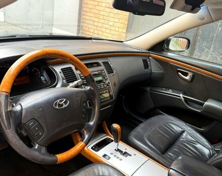 Черный Хендай Грандер, объемом двигателя 3.3 л и пробегом 299 тыс. км за 4999 $, фото 3 на Automoto.ua