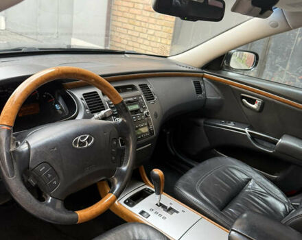 Черный Хендай Грандер, объемом двигателя 3.34 л и пробегом 299 тыс. км за 4999 $, фото 3 на Automoto.ua