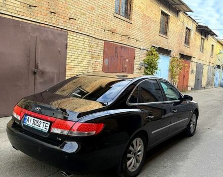 Черный Хендай Грандер, объемом двигателя 3.3 л и пробегом 299 тыс. км за 4999 $, фото 6 на Automoto.ua