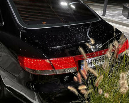 Черный Хендай Грандер, объемом двигателя 3.3 л и пробегом 230 тыс. км за 8500 $, фото 6 на Automoto.ua