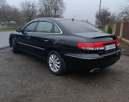 Черный Хендай Грандер, объемом двигателя 3.34 л и пробегом 240 тыс. км за 5500 $, фото 3 на Automoto.ua