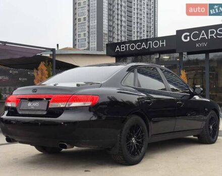 Черный Хендай Грандер, объемом двигателя 3.3 л и пробегом 163 тыс. км за 8500 $, фото 3 на Automoto.ua