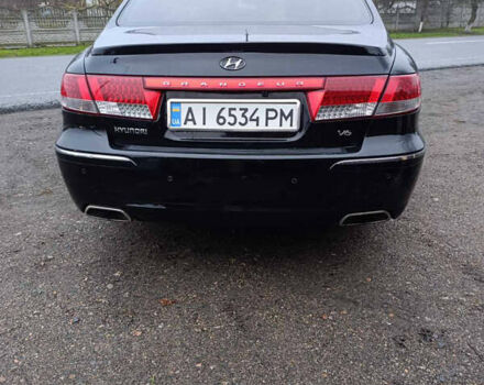 Черный Хендай Грандер, объемом двигателя 3.34 л и пробегом 240 тыс. км за 5500 $, фото 5 на Automoto.ua