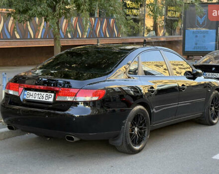 Черный Хендай Грандер, объемом двигателя 3.3 л и пробегом 165 тыс. км за 7990 $, фото 2 на Automoto.ua