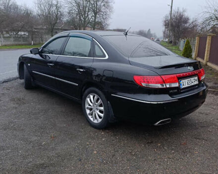 Черный Хендай Грандер, объемом двигателя 3.34 л и пробегом 240 тыс. км за 5500 $, фото 4 на Automoto.ua