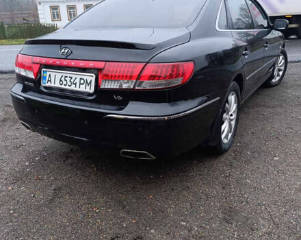 Черный Хендай Грандер, объемом двигателя 3.34 л и пробегом 240 тыс. км за 5500 $, фото 6 на Automoto.ua