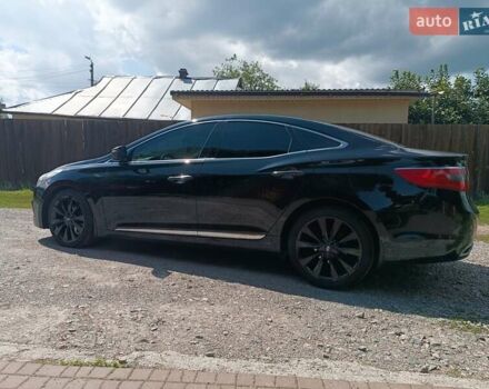 Чорний Хендай Грандер, об'ємом двигуна 3 л та пробігом 170 тис. км за 12500 $, фото 12 на Automoto.ua