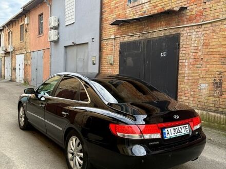 Чорний Хендай Грандер, об'ємом двигуна 3.3 л та пробігом 299 тис. км за 4999 $, фото 1 на Automoto.ua