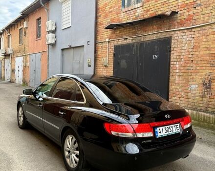 Черный Хендай Грандер, объемом двигателя 3.3 л и пробегом 299 тыс. км за 4999 $, фото 1 на Automoto.ua